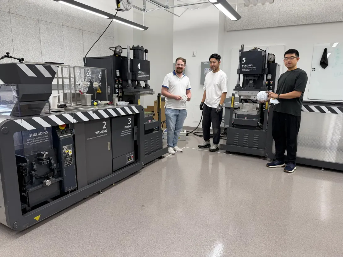 Pictured left to right: Tim Trent, IPaT’s lab director for the Trash Lab; Arthur Huang, CEO of Miniwiz; and Tai Liu, mechanical engineer with Miniwiz. In this picture, they are installing the miniTrashpresso system in the TSRB building.